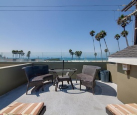 Ocean-View Oasis with Rooftop Deck - Steps to Beach home