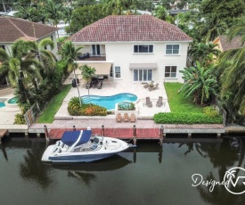 Gorgeous 5 Bedroom Home w/heated Pool Canal Front